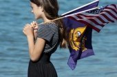 A girl watching Blue Angels
