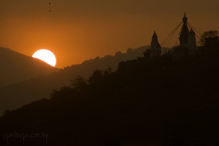 A view of sunset with silhouette of Shwayambhu, taken from the hills of Maharajgunj, Kathmandu.