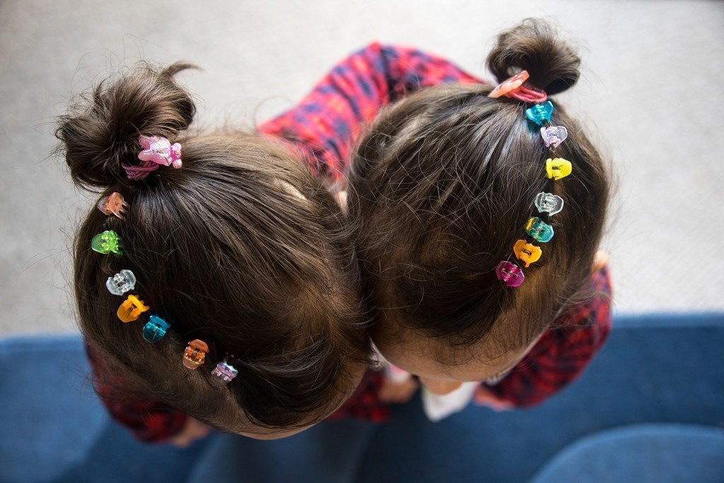 Colorful clips in Ellen & Erin's hair.